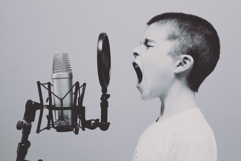boy shouting into a microphone