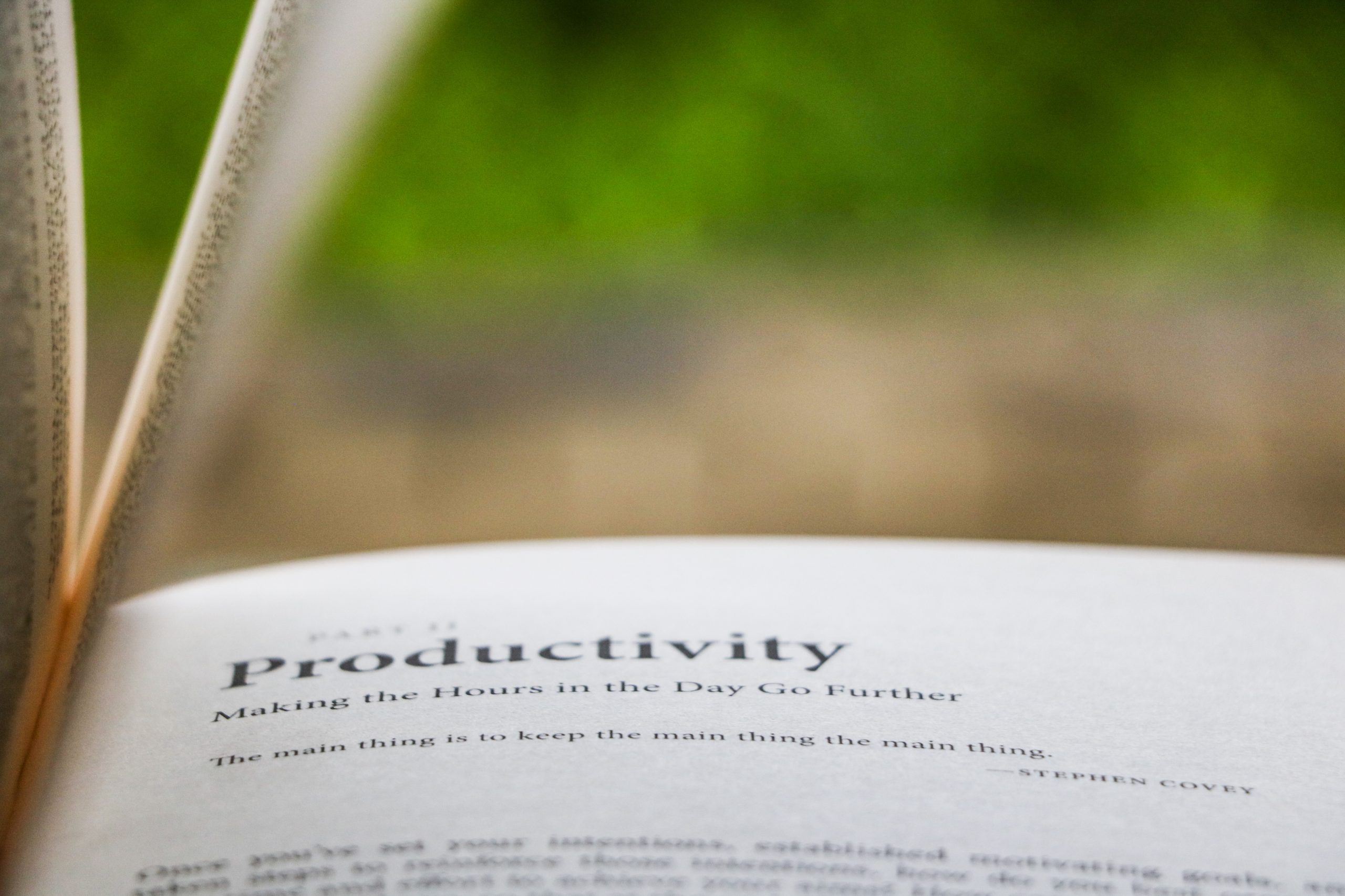 book open to the word productivity
